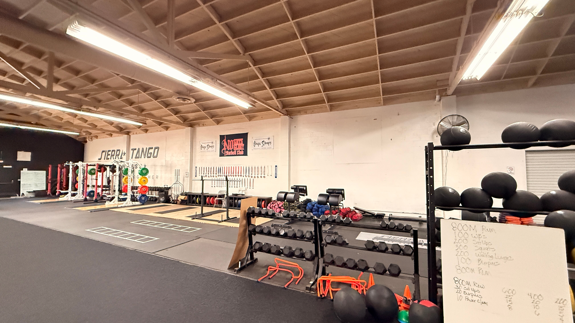 Sierra Tango Fitness open training floor with dumbbell racks and conditioning equipment